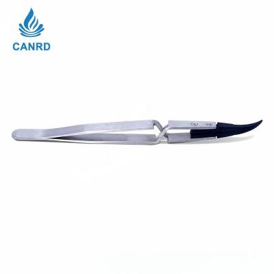 Reverse-Action Tweezers with Replaceable Tips